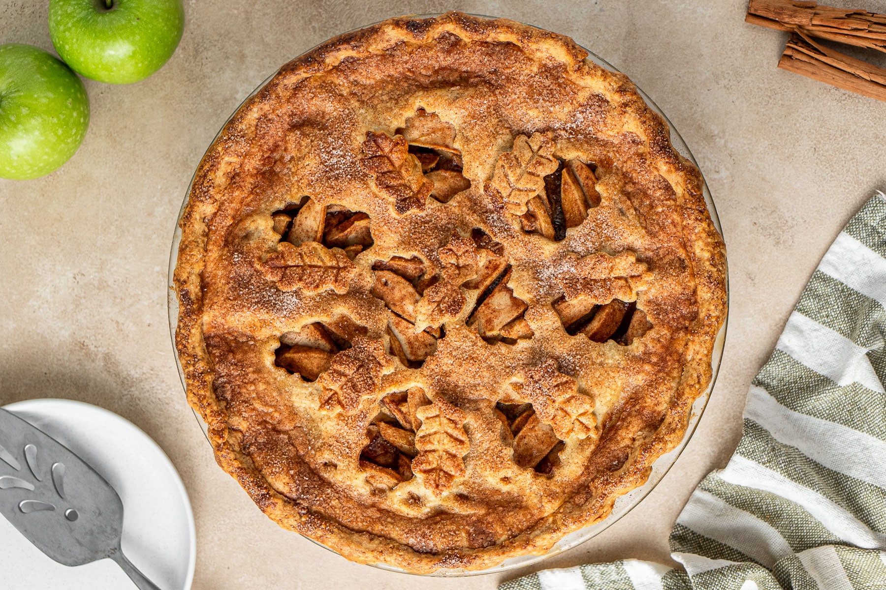 Wide overhead view of a freshly baked classic vegan apple pie
